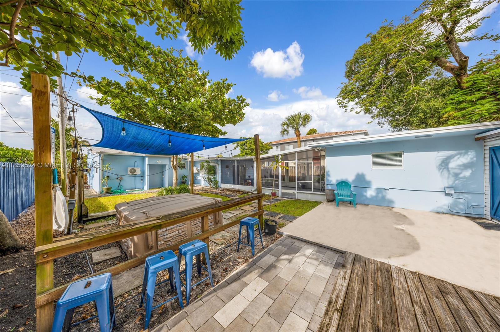 817 Southwest 12th Avenue Fort Lauderdale, FL 33315 - Photo 5 of 37 a view of a house with backyard and sitting area