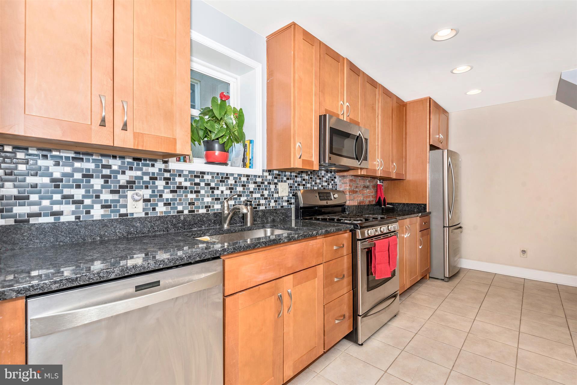 72 Kinship Road Baltimore, MD 21222 - Photo 13 of 28 Beautiful Kitchen with Upgraded Backsplash