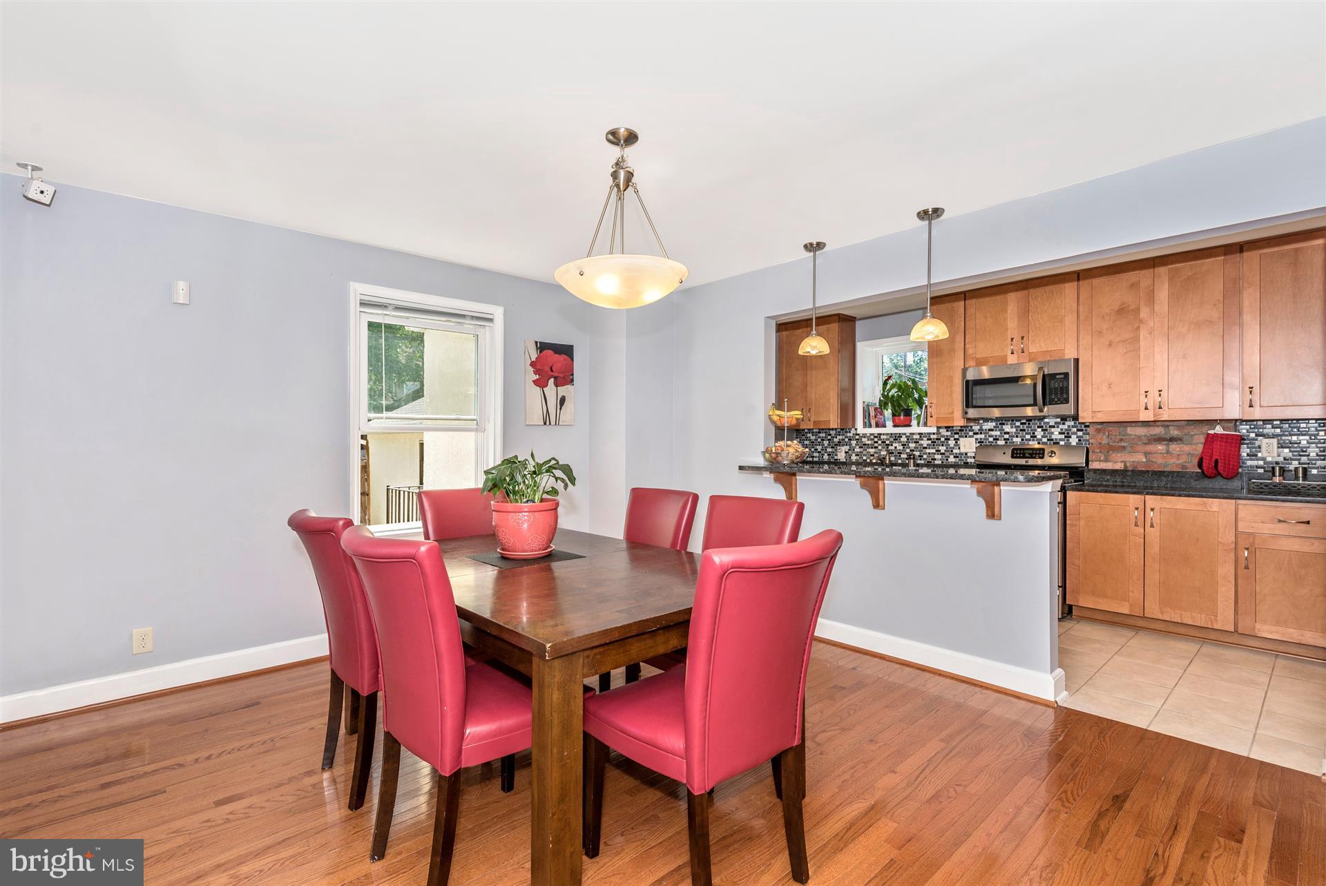 72 Kinship Road Baltimore, MD 21222 - Photo 9 of 28 Dining Room has Breakfast Bar into Kitchen