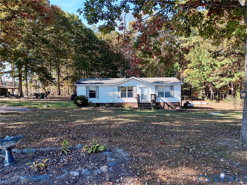 2500 Mill Quarter Road Ford, VA 23850 - Photo 1 of 3 a front view of a house with a yard
