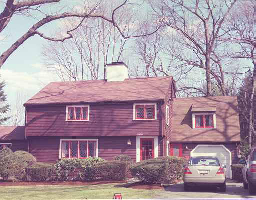 45 River Glen Road Wellesley, MA 02481 - Photo 1 of 1 a front view of a house with garden