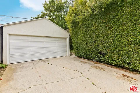 a house view with a backyard