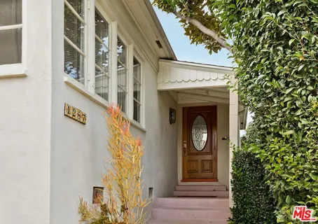a view of an entryway with sitting space