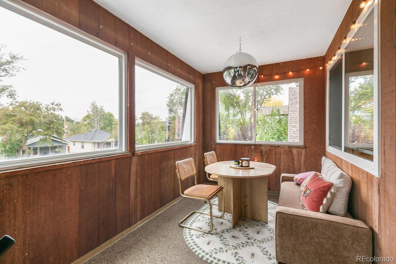 3820 Xavier Street Denver, CO 80212 - Photo 23 of 35 a dining room with furniture and window