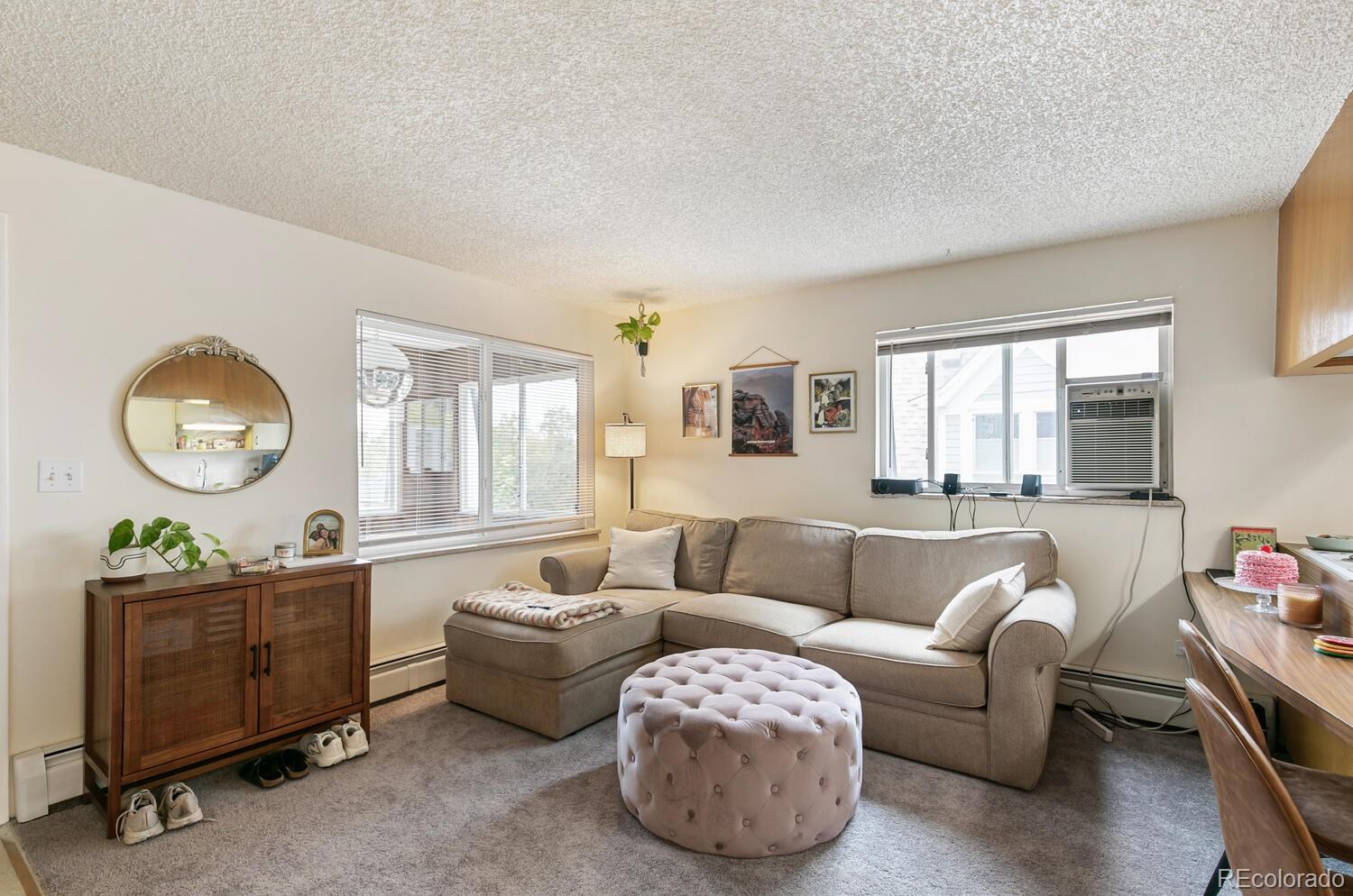 3820 Xavier Street Denver, CO 80212 - Photo 34 of 35 a living room with furniture and a large window