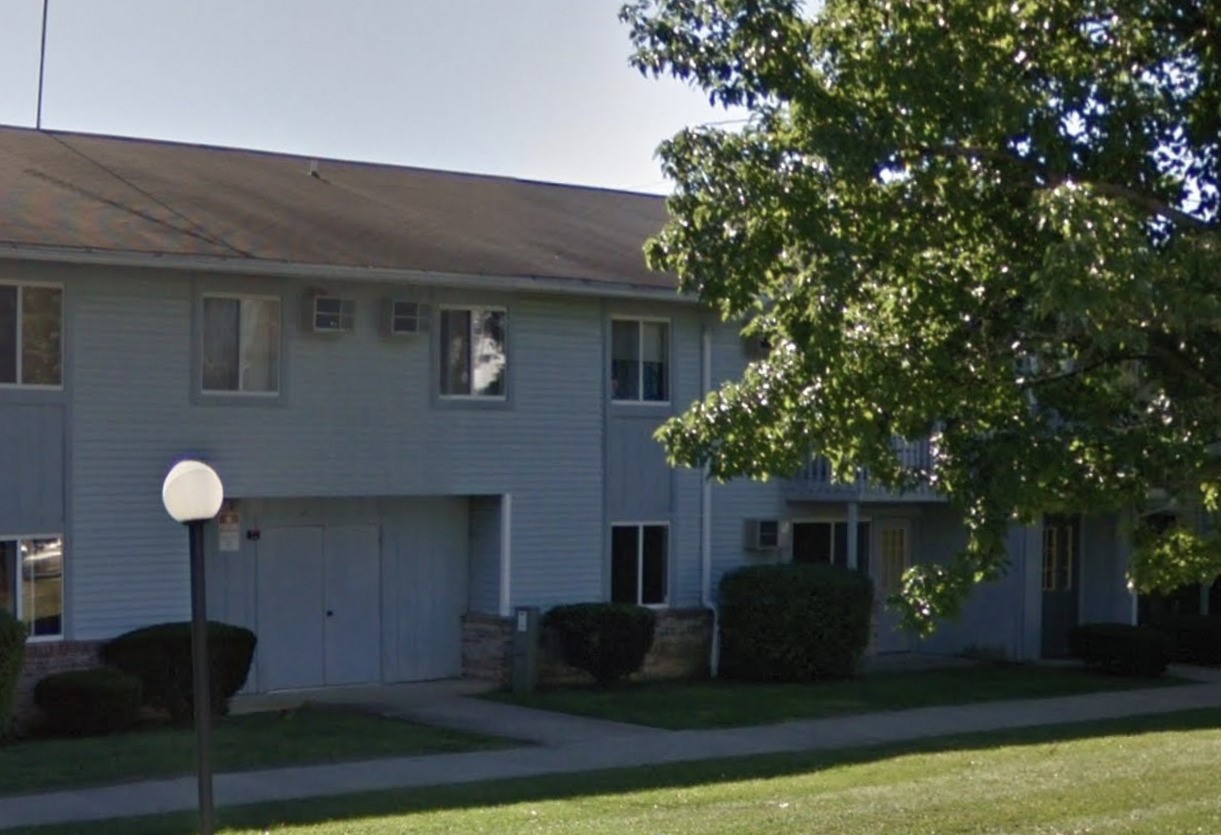 201 Country Club Batesville, IN 47006 - Photo 2 of 11 a front view of a house with a yard