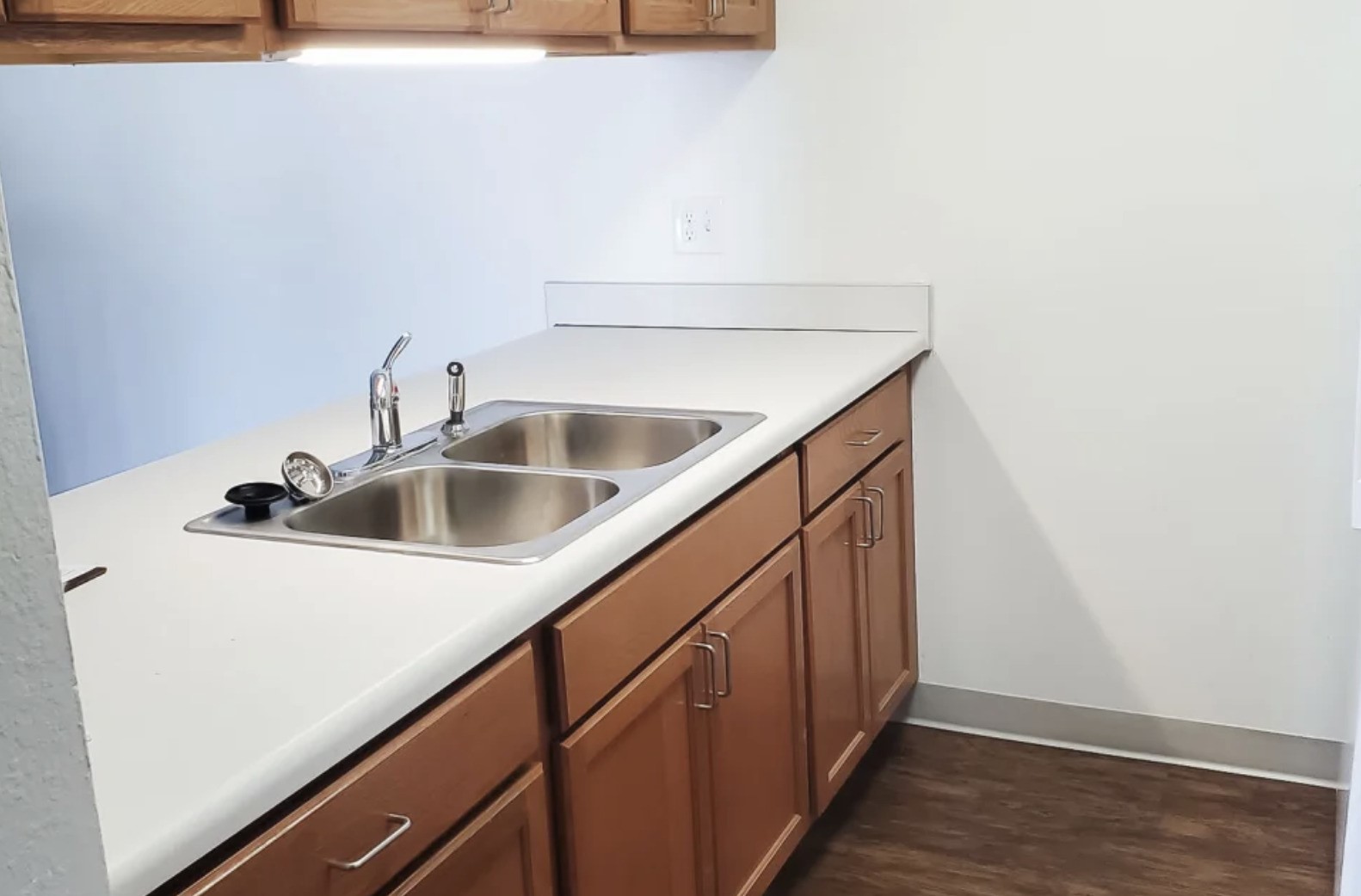 201 Country Club Batesville, IN 47006 - Photo 5 of 11 a utility room with sink and wooden floor