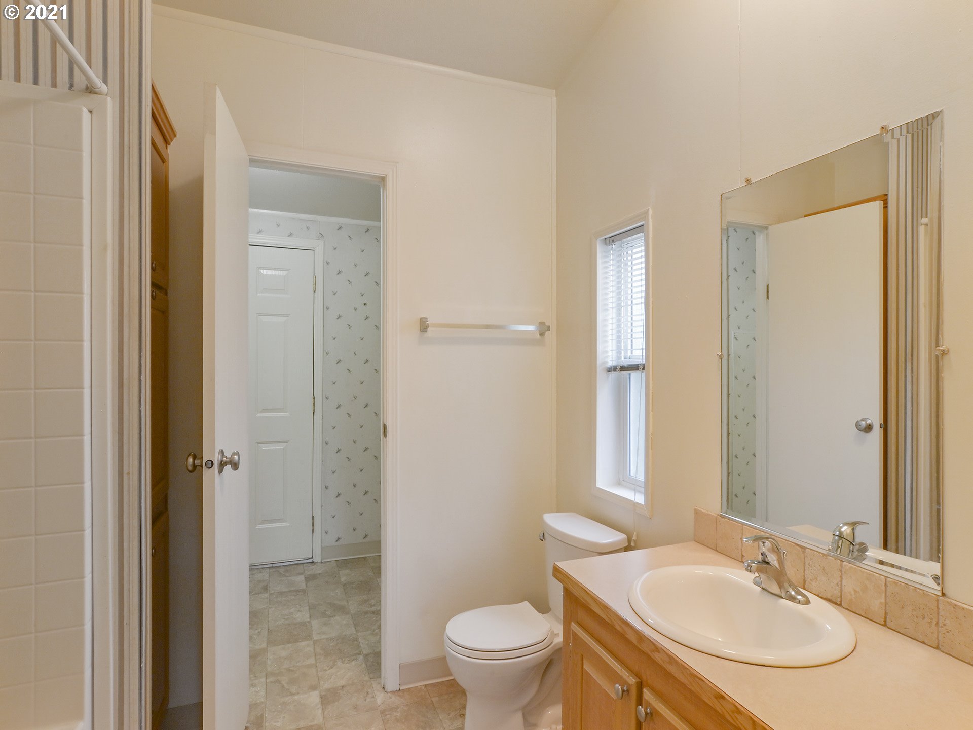 469 48th Street Springfield, OR 97478 - Photo 23 of 32 a bathroom with a sink toilet and shower