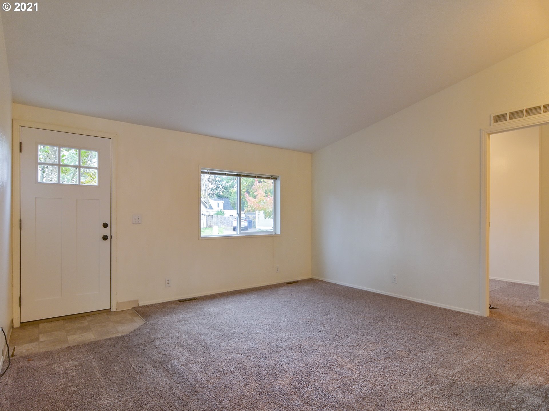 469 48th Street Springfield, OR 97478 - Photo 5 of 32 a view of an empty room with a window