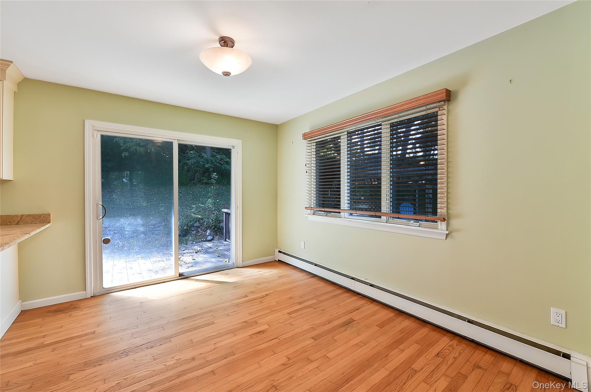 18 Stage Road Pine Island, NY 10969 - Photo 16 of 42 a view of an empty room with glass door and a window