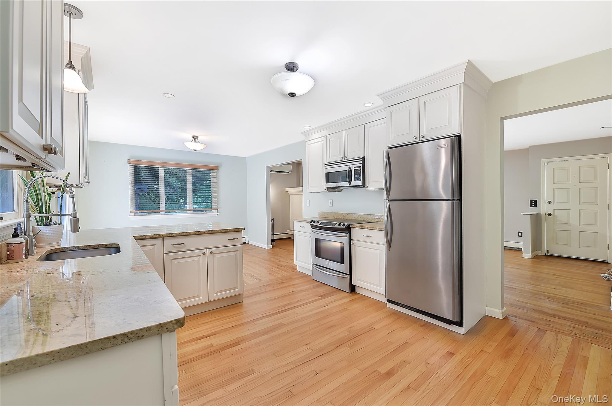 18 Stage Road Pine Island, NY 10969 - Photo 20 of 42 a kitchen with granite countertop a refrigerator stove top oven and sink