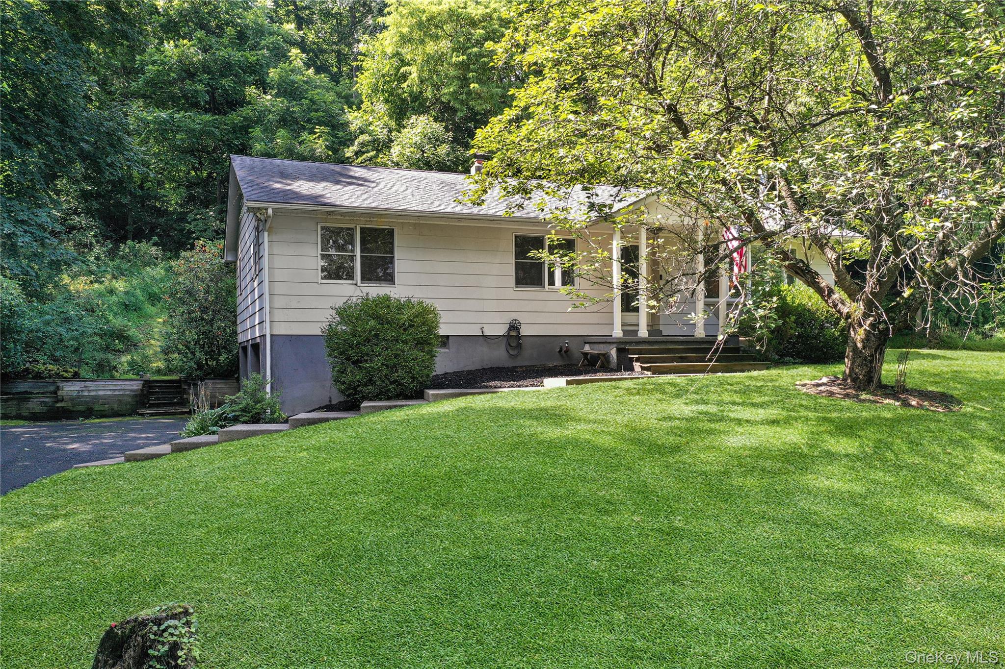 18 Stage Road Pine Island, NY 10969 - Photo 7 of 42 front view of a house with a yard