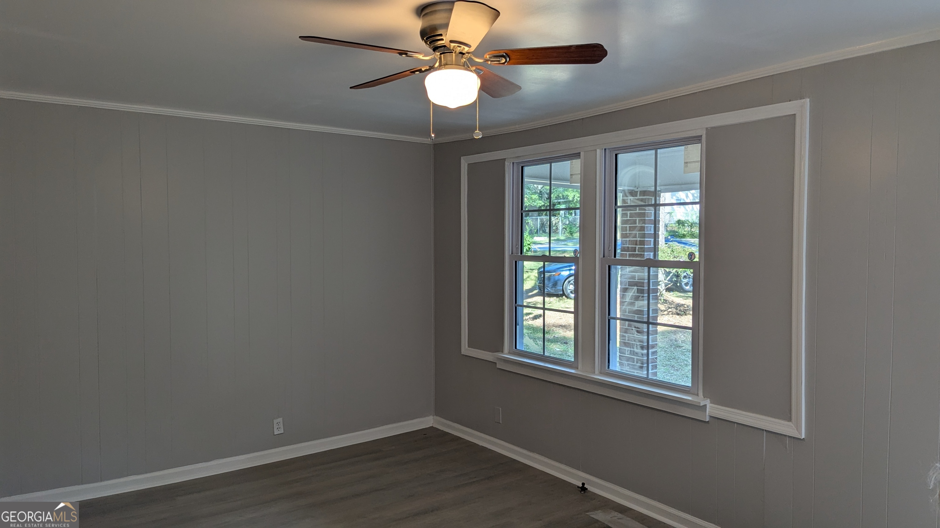 3444 Mogul Road Macon, GA 31217 - Photo 2 of 7 a room with ceiling fan and window