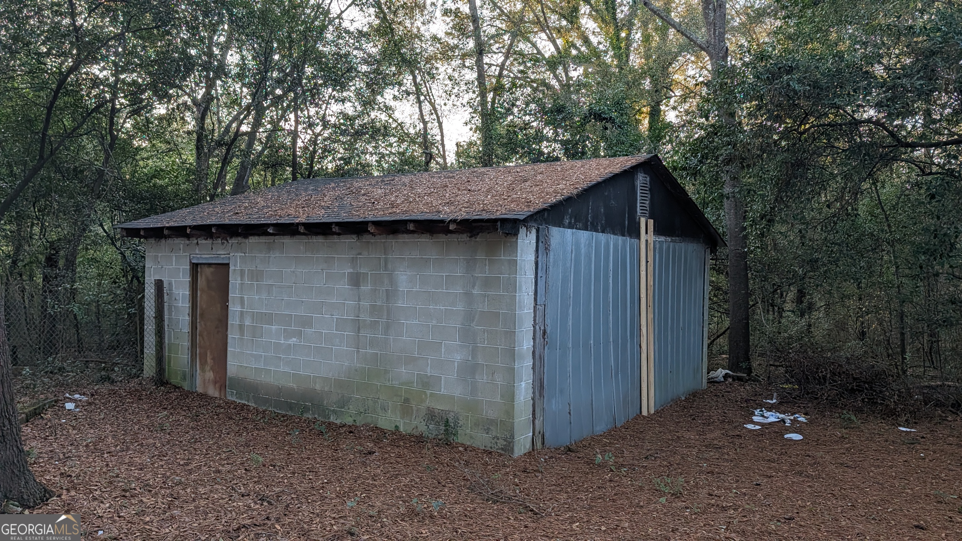 3444 Mogul Road Macon, GA 31217 - Photo 7 of 7 a backyard of a house with lots of green space