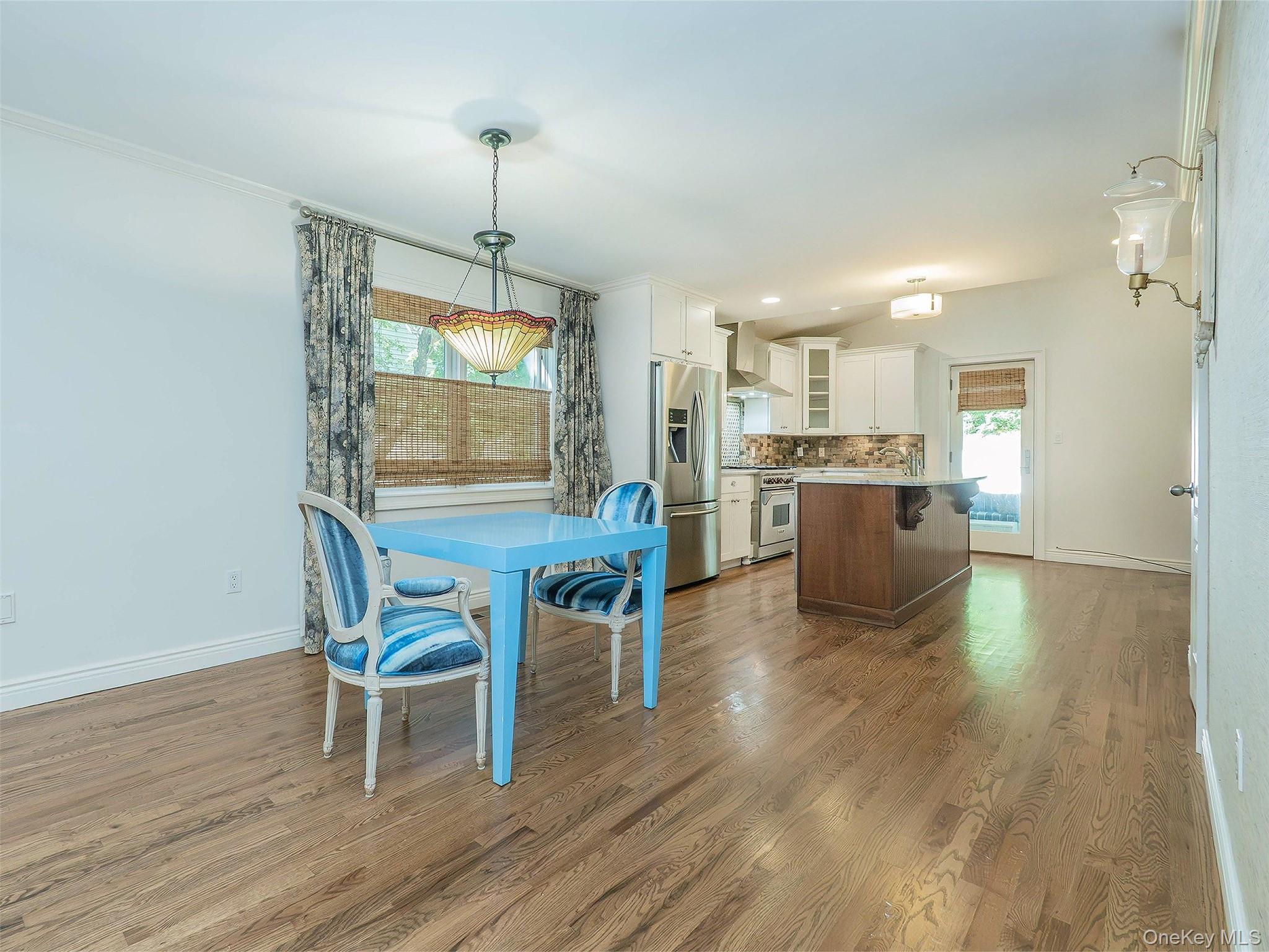 21 Marwood Road North Port Washington, NY 11050 - Photo 7 of 35 a dining room with furniture and wooden floor
