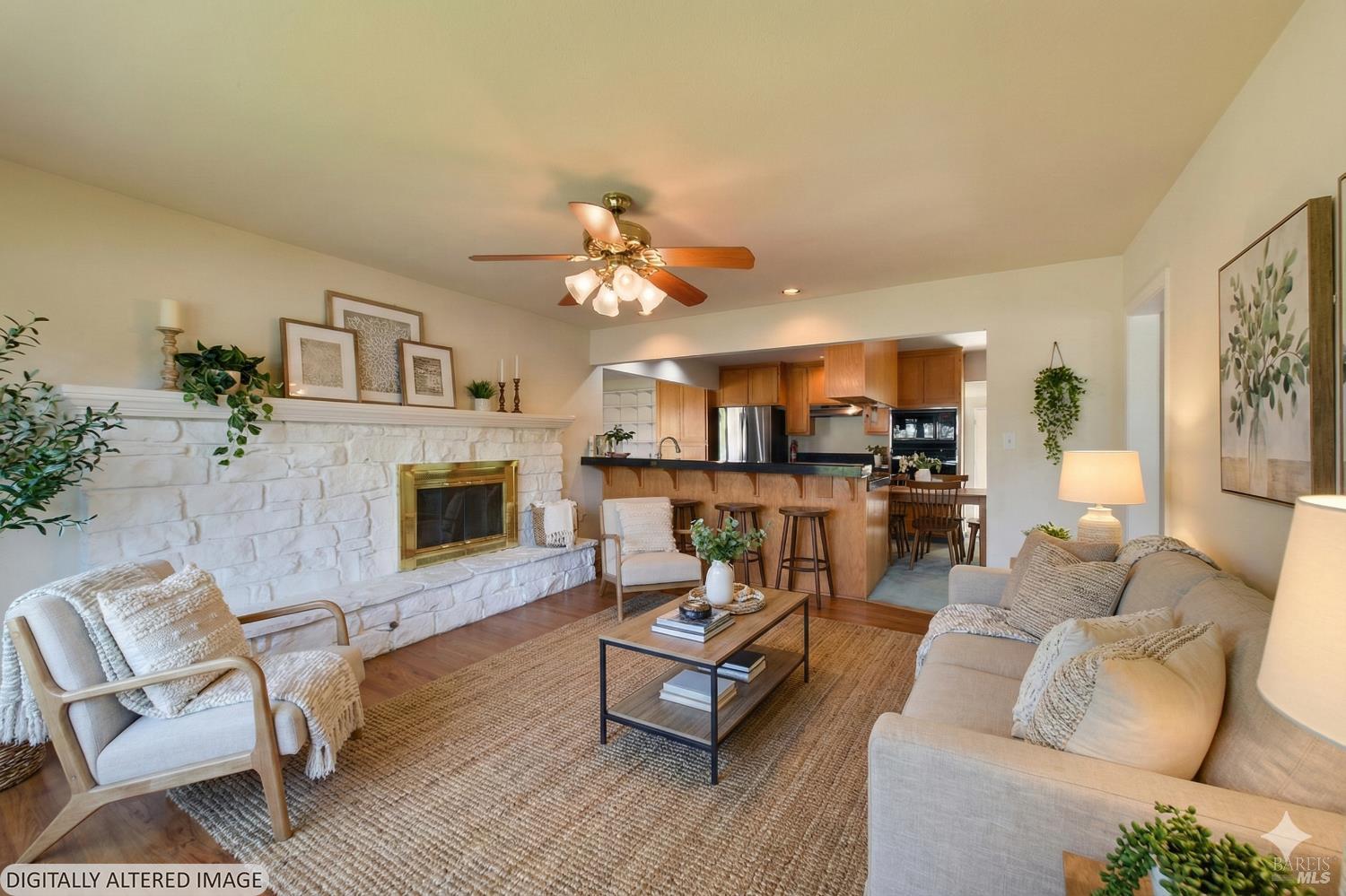 135 Fulton Place Windsor, CA 95492 - Photo 9 of 41 a living room with furniture and kitchen view