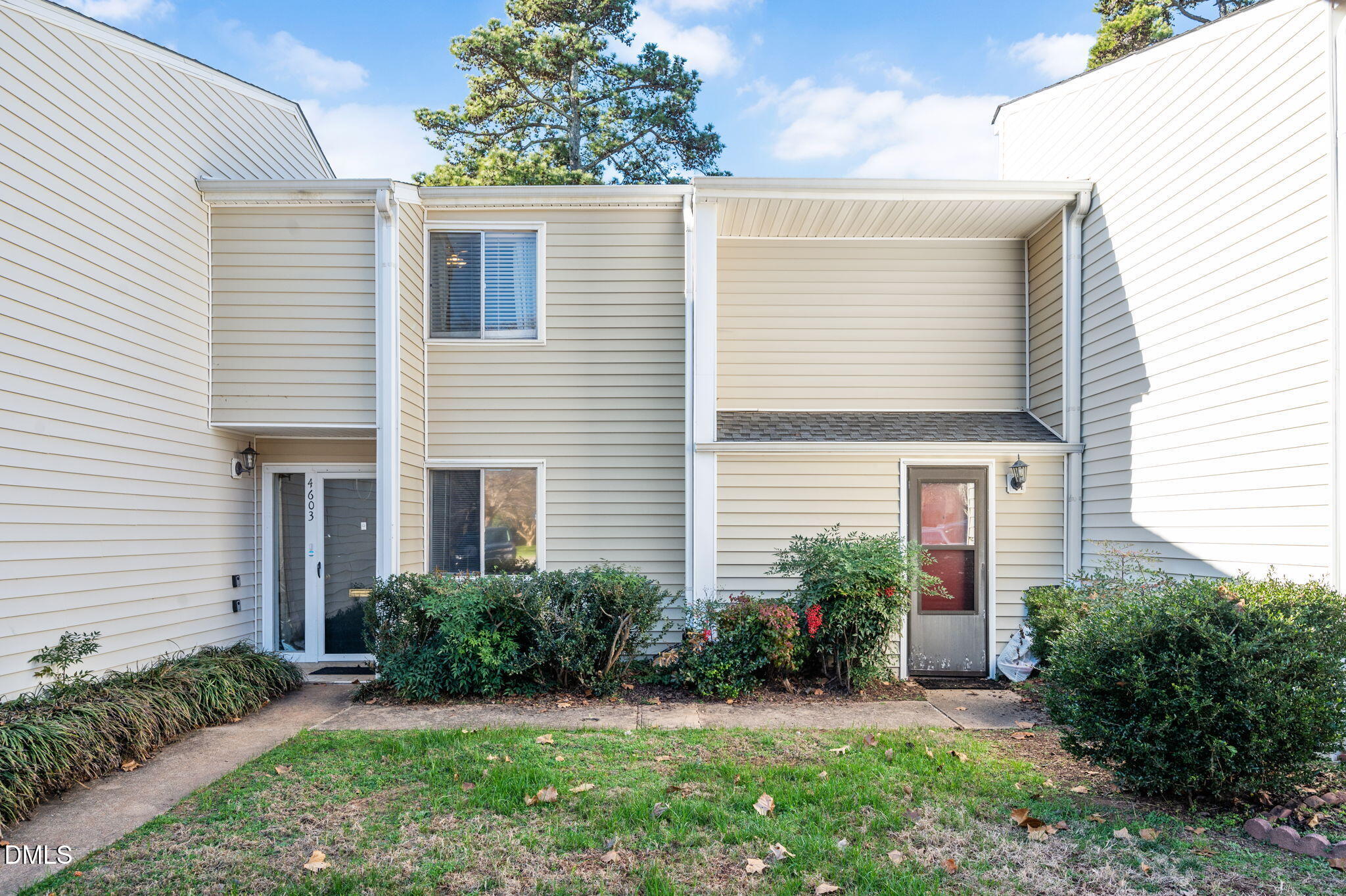 4603 Edwards Mill Road Raleigh, NC 27612 - Photo 26 of 26 a view of a house with a yard and plants