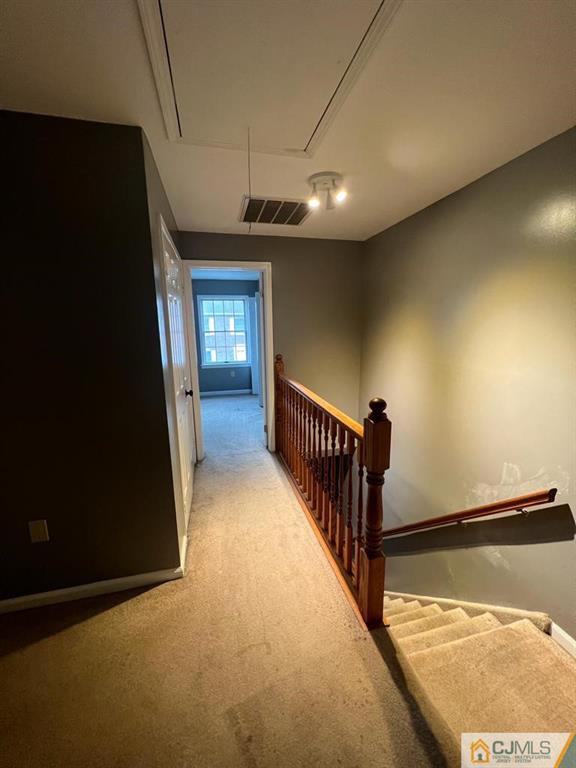 839 Valley Street, Unit C Vauxhall, NJ 07088 - Photo 6 of 10 a view of a hallway with window