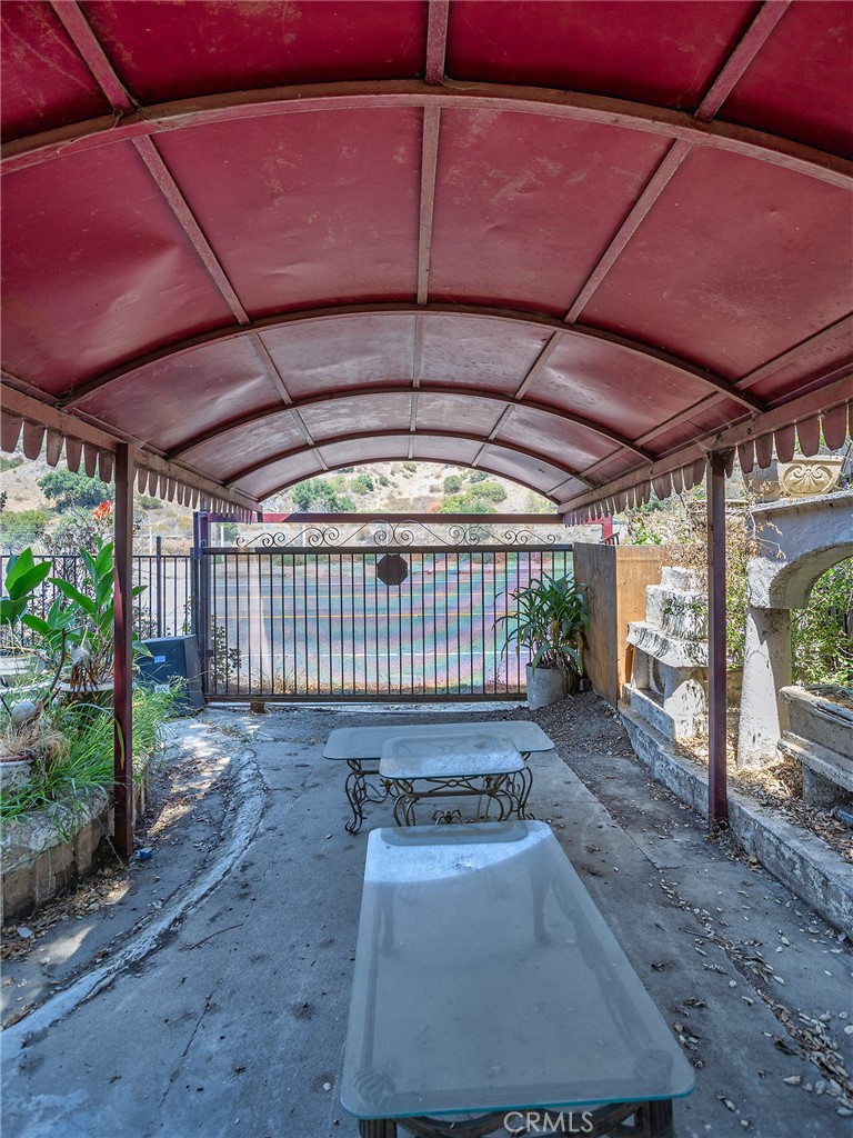 8618 La Tuna Canyon Road Sun Valley, CA 91352 - Photo 32 of 50 a view of a backyard with a table and chair