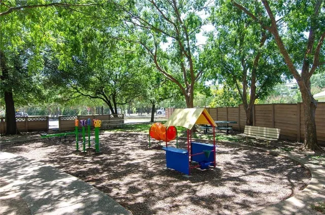 a view of a park with slide