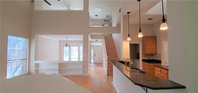 a view of a living room and bathroom