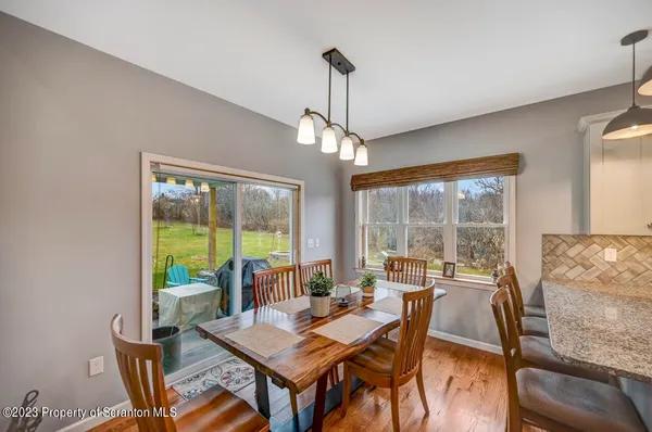 a kitchen with stainless steel appliances granite countertop a refrigerator sink and cabinets