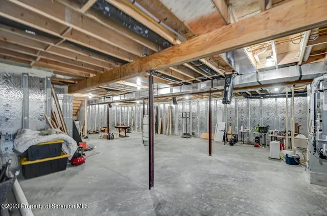 a front view of house with yard and trees