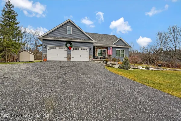a front view of house with yard