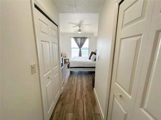 a balcony with table and chairs