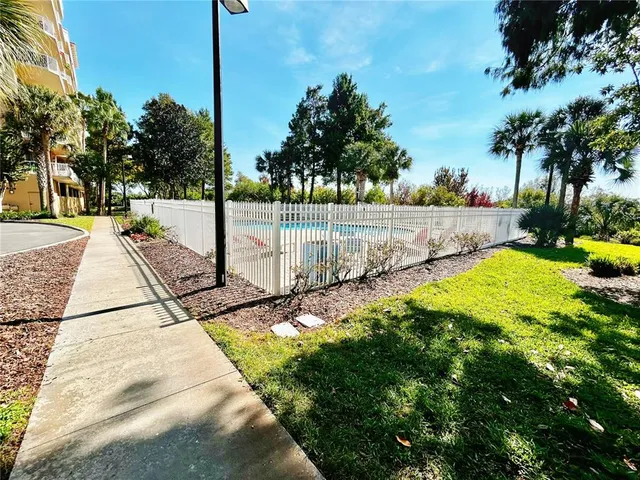an outdoor space with lounge chair