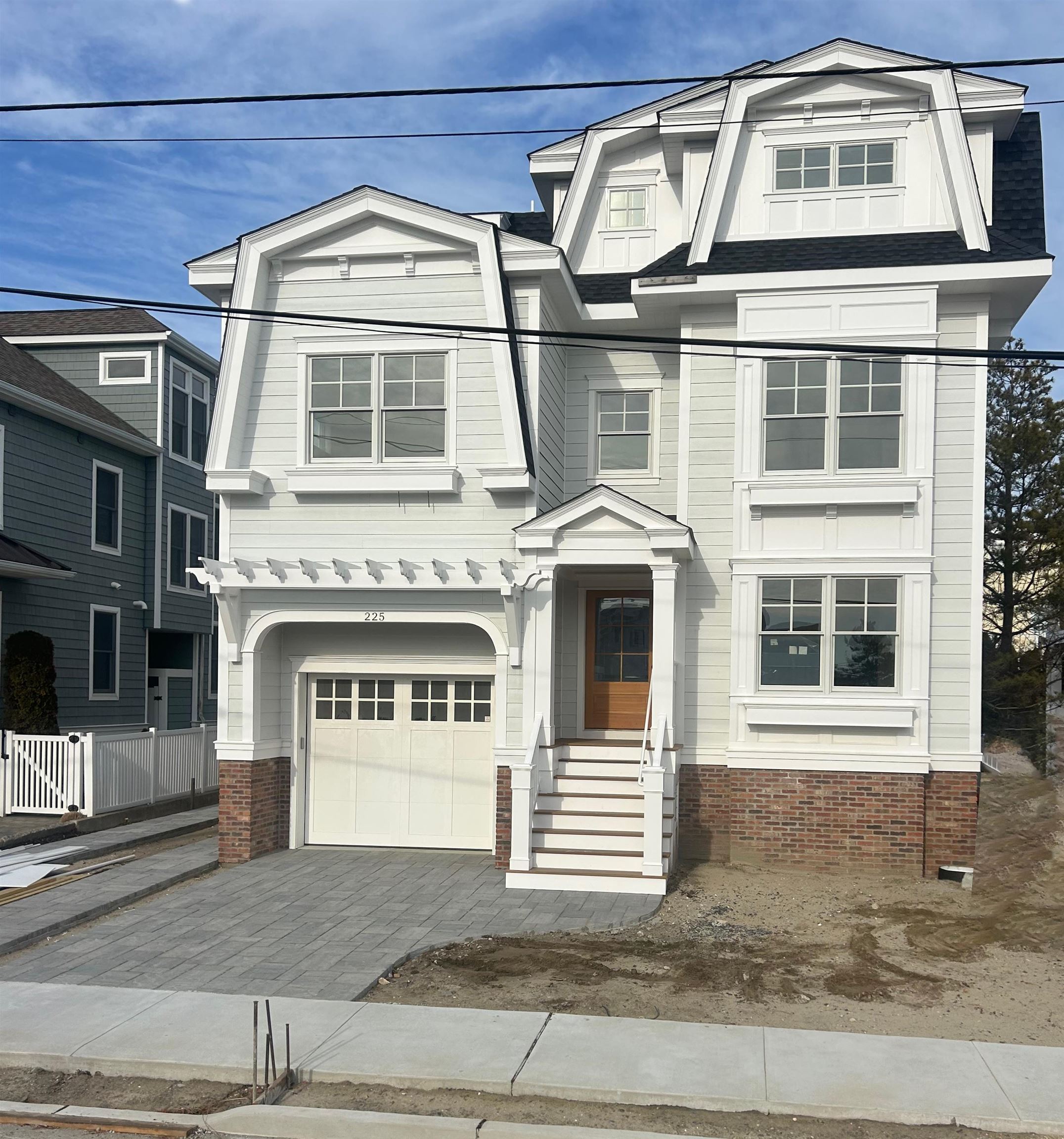 a front view of a house with a garage