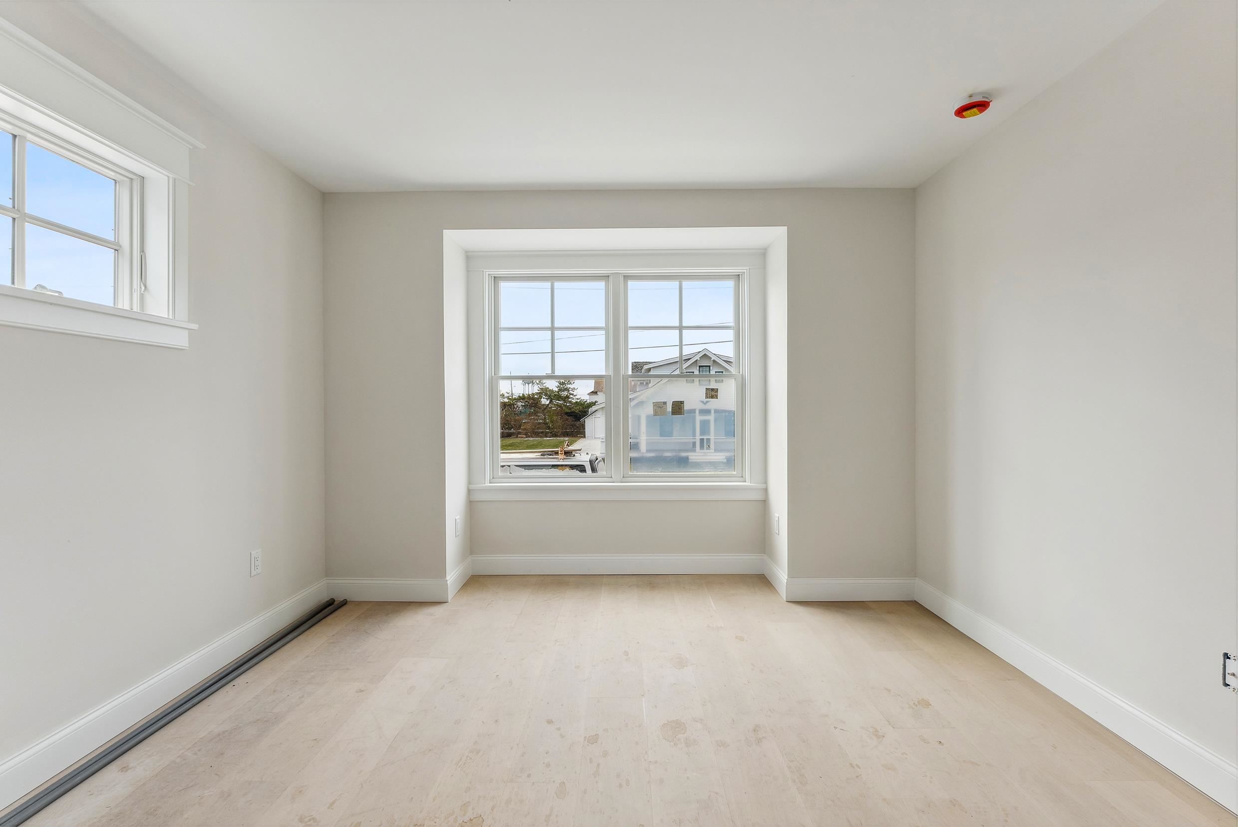 225 7th Street Avalon, NJ 08202 - Photo 12 of 37 an empty room with a window