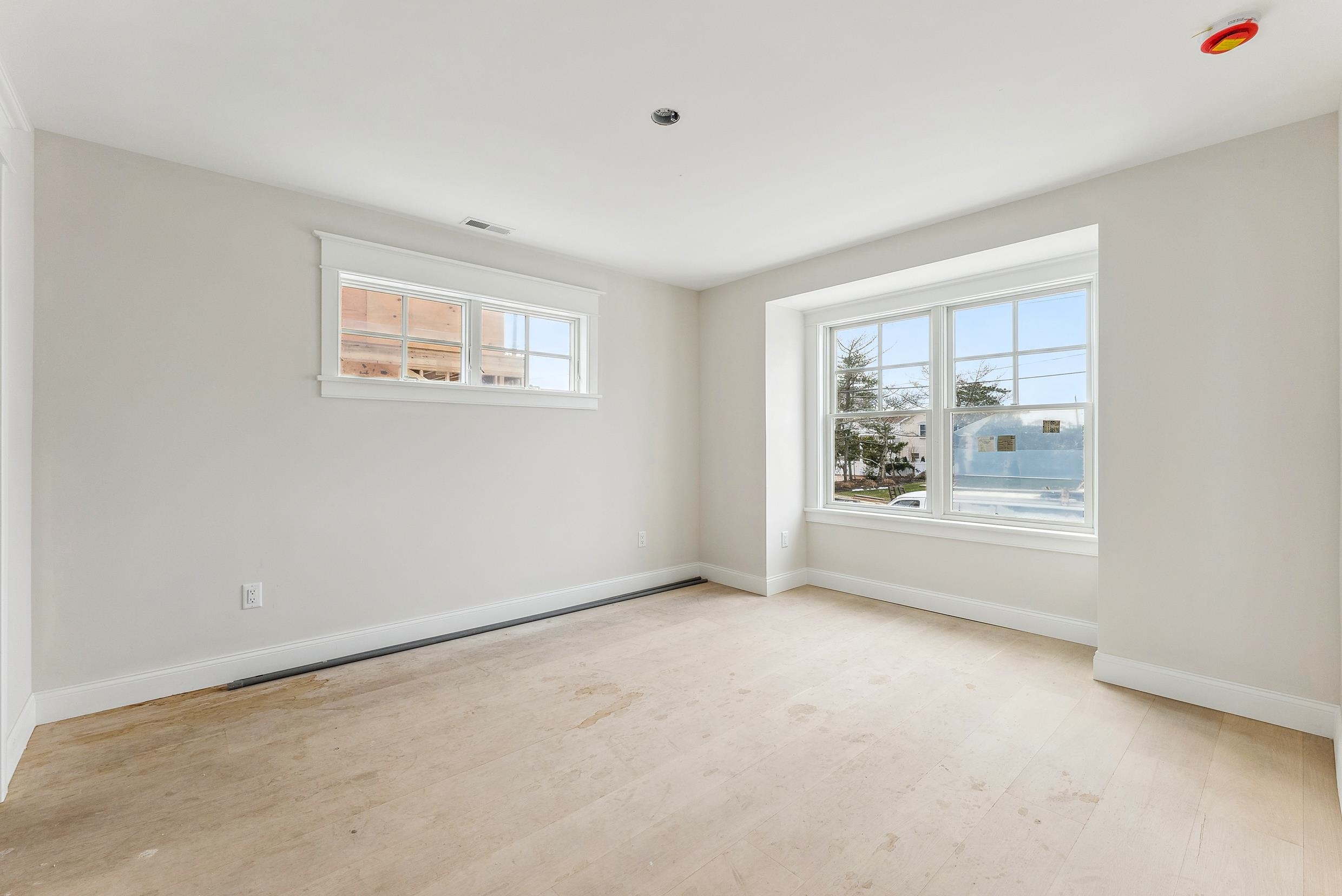 225 7th Street Avalon, NJ 08202 - Photo 14 of 37 an empty room with a window