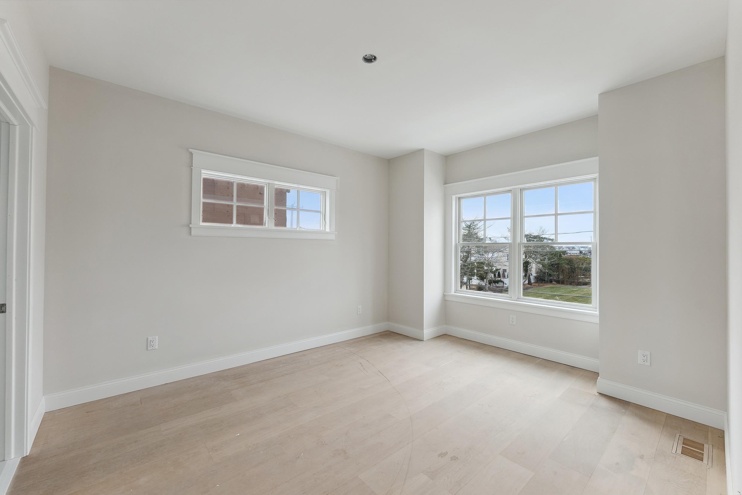225 7th Street Avalon, NJ 08202 - Photo 15 of 37 an empty room with windows