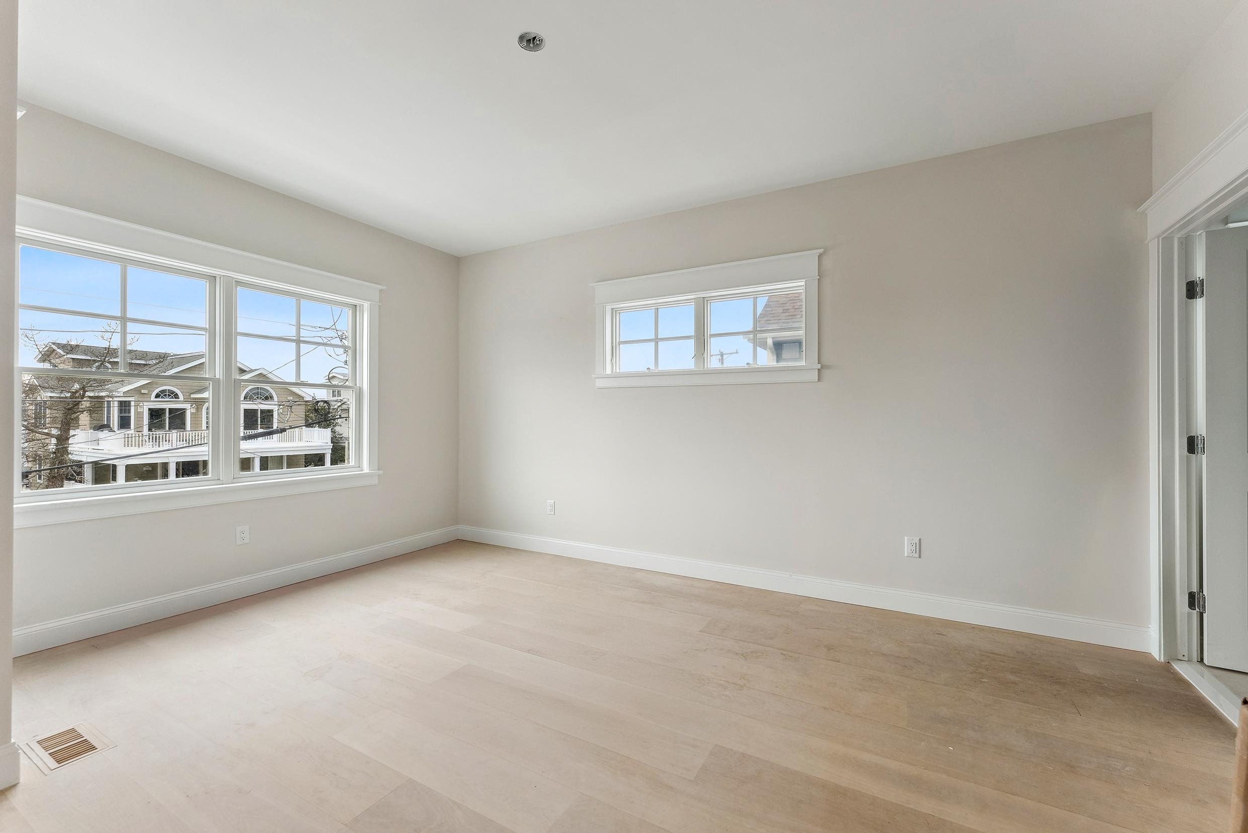225 7th Street Avalon, NJ 08202 - Photo 19 of 37 an empty room with a window