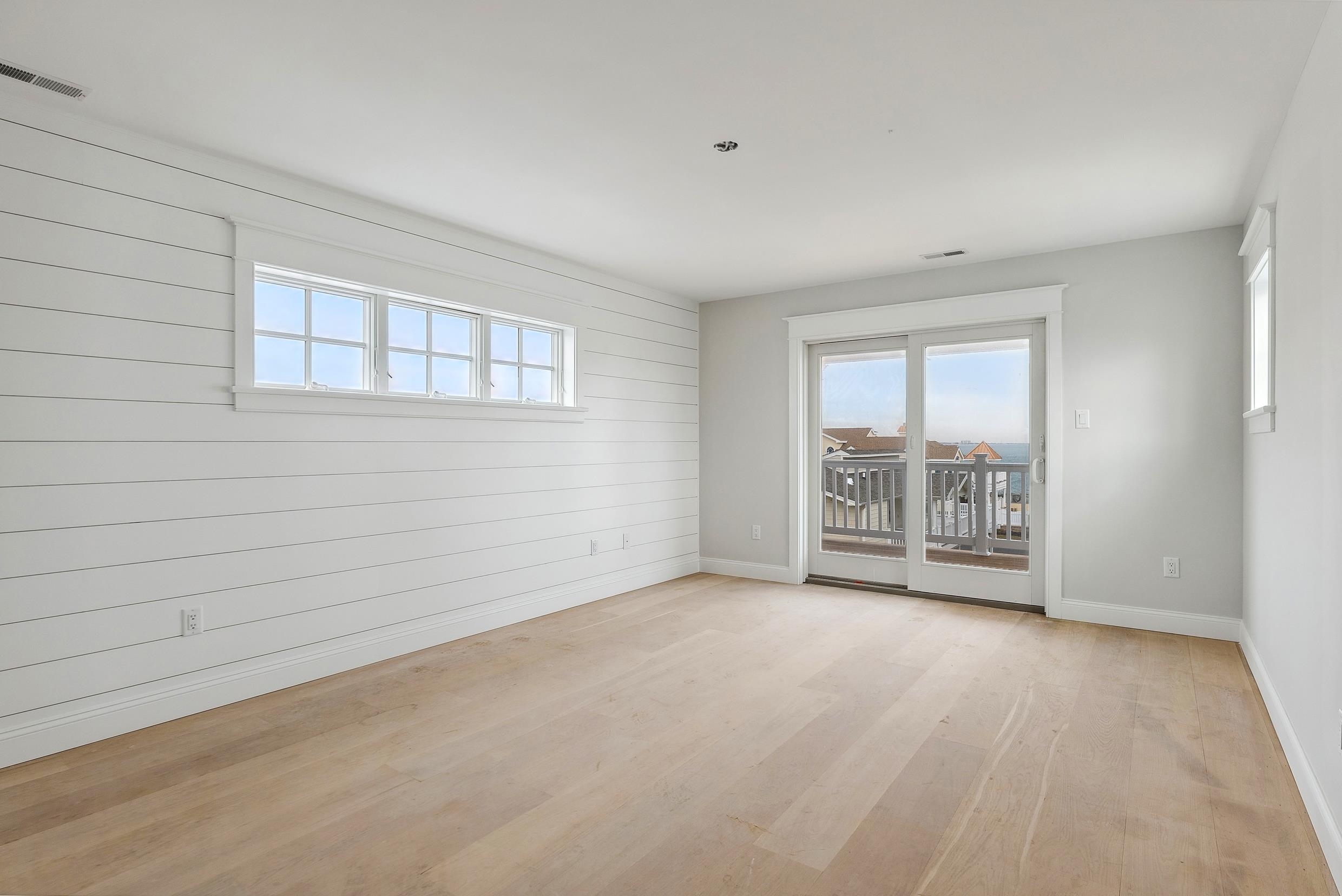 225 7th Street Avalon, NJ 08202 - Photo 22 of 37 an empty room with windows