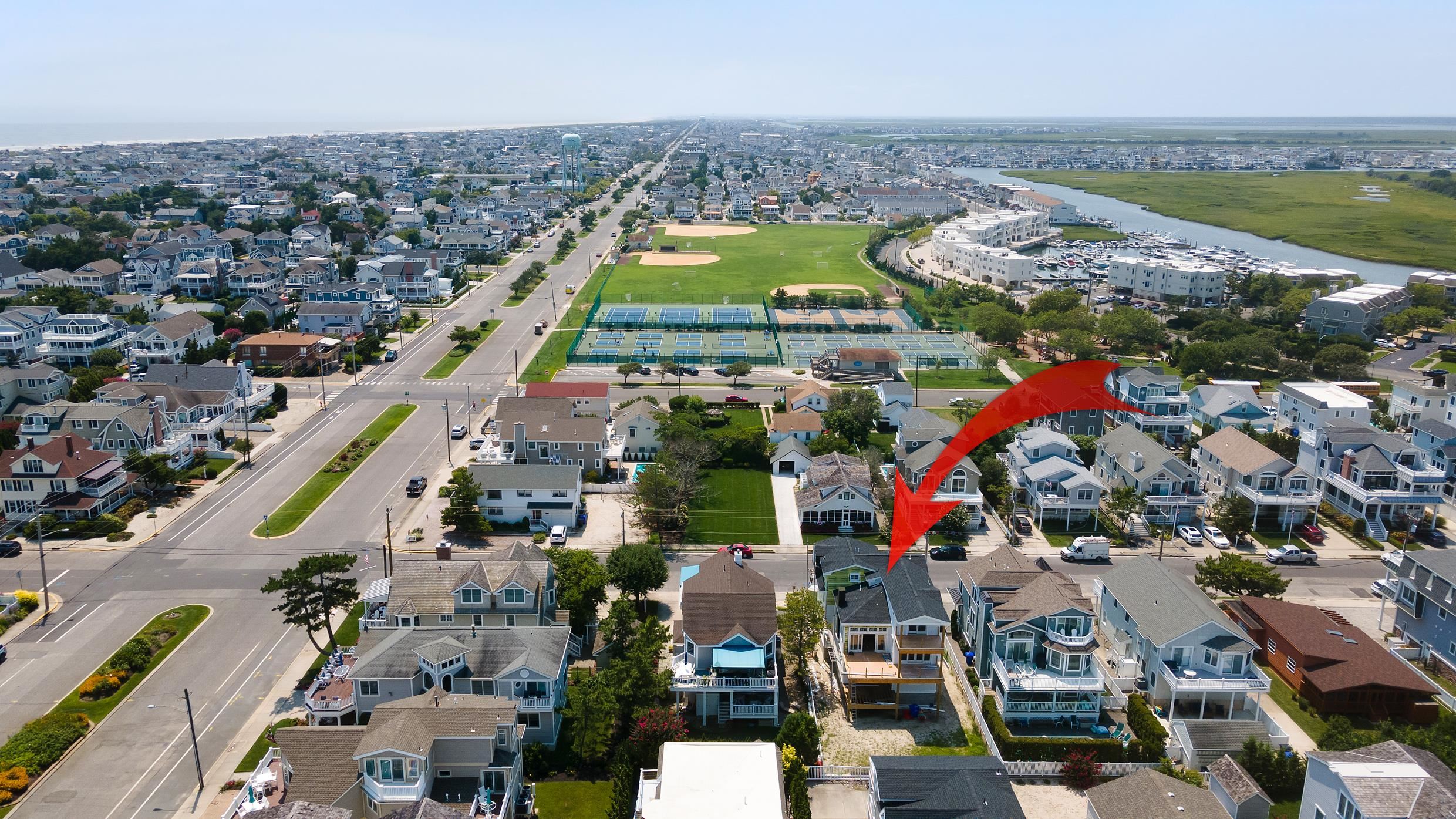225 7th Street Avalon, NJ 08202 - Photo 34 of 37 an aerial view of residential building and lake