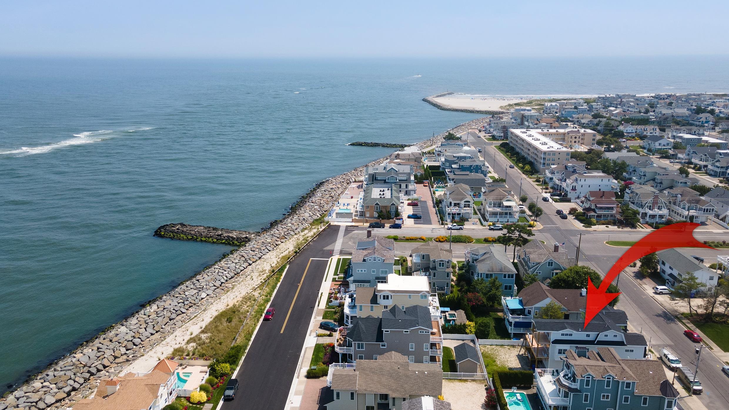 225 7th Street Avalon, NJ 08202 - Photo 35 of 37 a view of a balcony with an ocean view