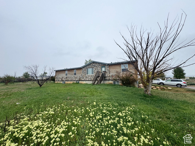 580 East 400 North Spring City, UT 84662 - Photo 4 of 40 View of property exterior with a yard