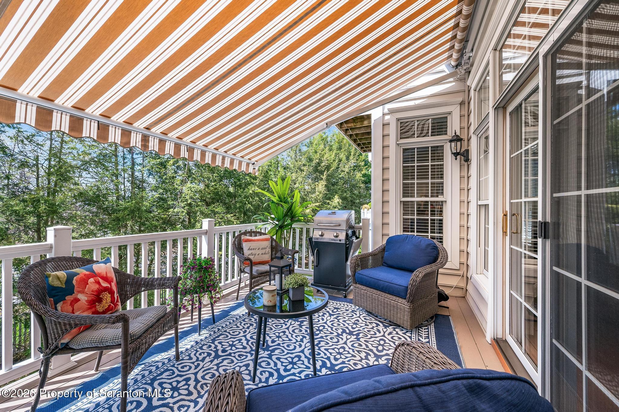 202 Thackeray Cl Moosic, PA 18507 - Photo 19 of 51 Deck with Retractable Awning