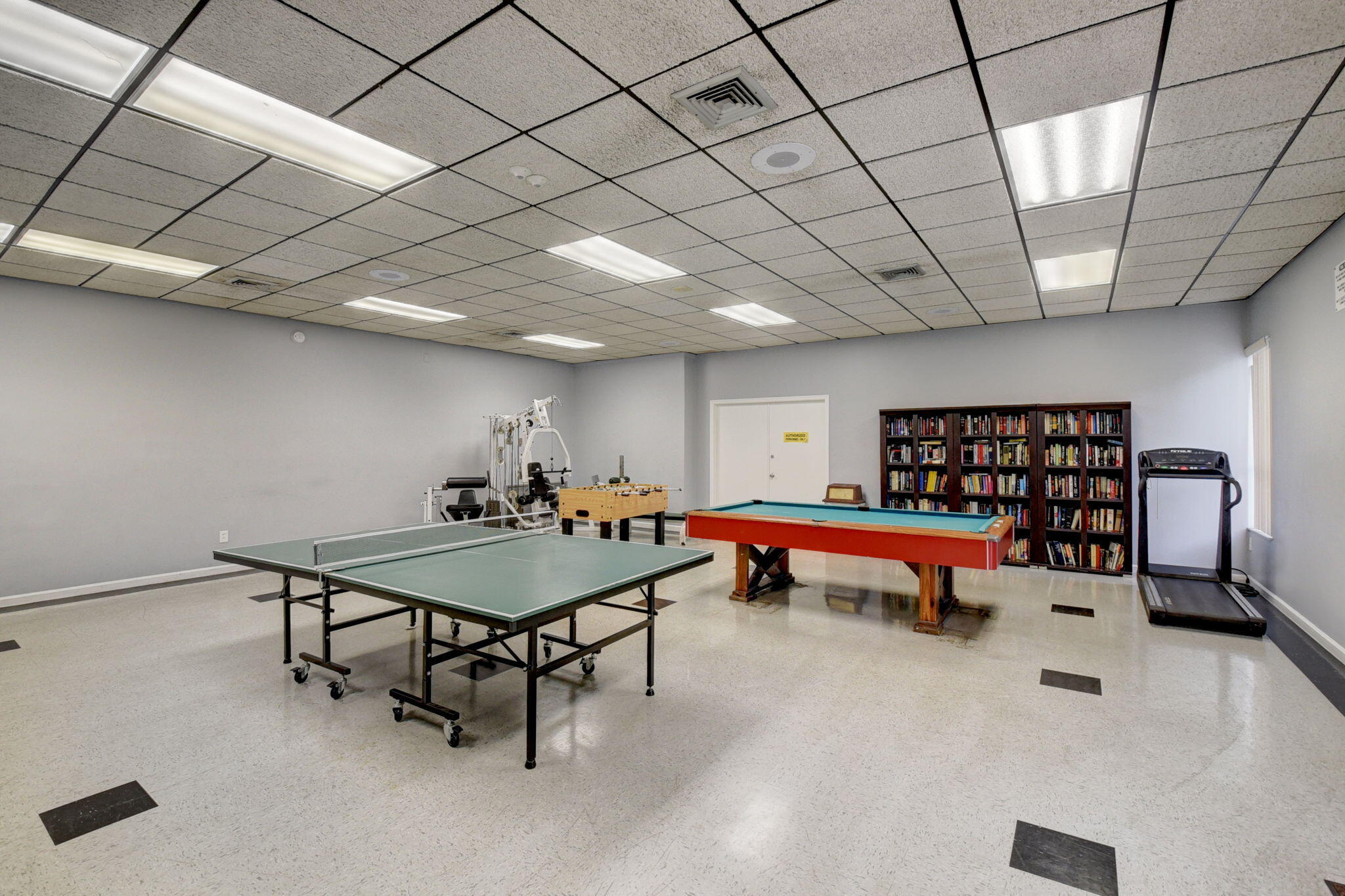 23398 Southwest 54th Way, Unit A Boca Raton, FL 33433 - Photo 27 of 29 a room with furniture and air hockey table