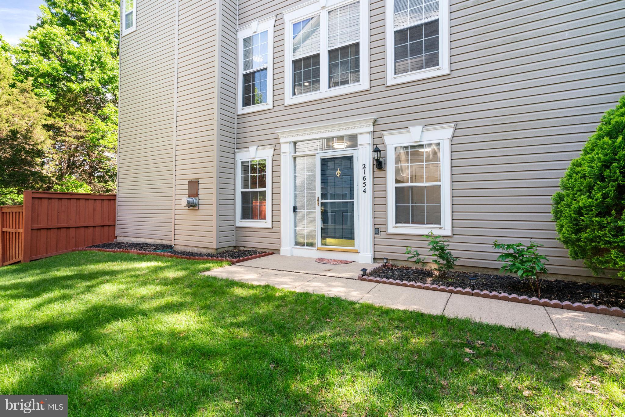 21654 Frame Square Broadlands, VA 20148 - Photo 5 of 43 Charming entryway with lush greenery.
