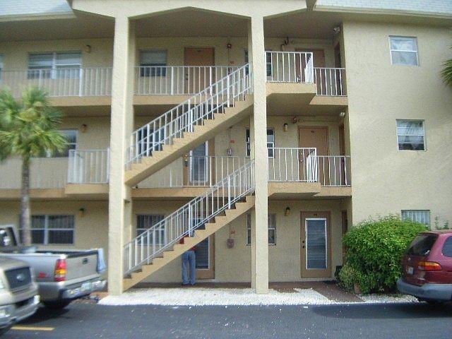 4191 Northwest 26th Street, Unit 170 Lauderhill, FL 33313 - Photo 1 of 1 a view of houses with a street