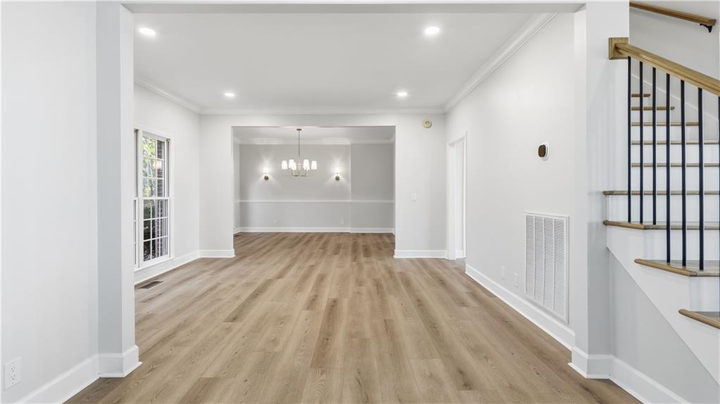 141 Brow Lake Road Lookout Mountain, GA 30750 - Photo 11 of 66 a view of empty room with wooden floor