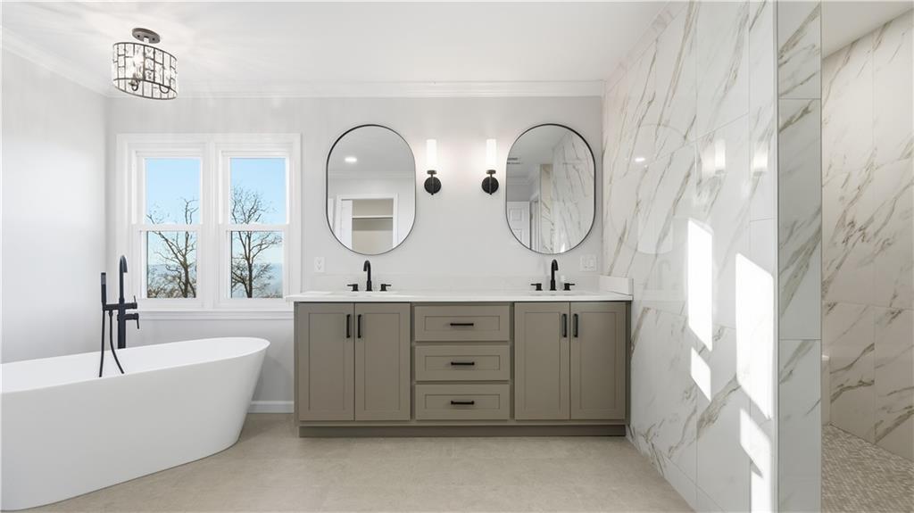 141 Brow Lake Road Lookout Mountain, GA 30750 - Photo 29 of 66 a bathroom with a double vanity sink mirror and bathtub