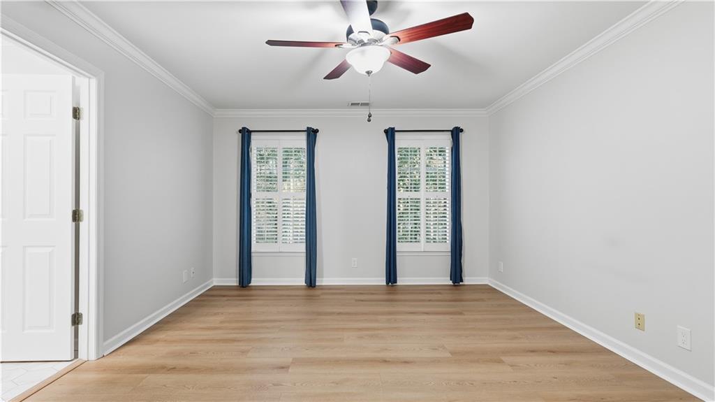 141 Brow Lake Road Lookout Mountain, GA 30750 - Photo 38 of 66 a view of empty room with window and ceiling fan