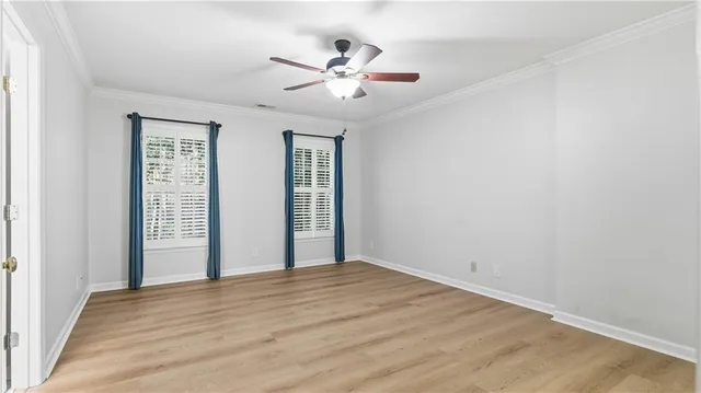 a view of a balcony with furniture