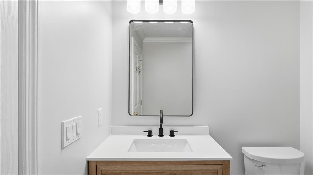 141 Brow Lake Road Lookout Mountain, GA 30750 - Photo 42 of 66 a bathroom with a sink and a toilet