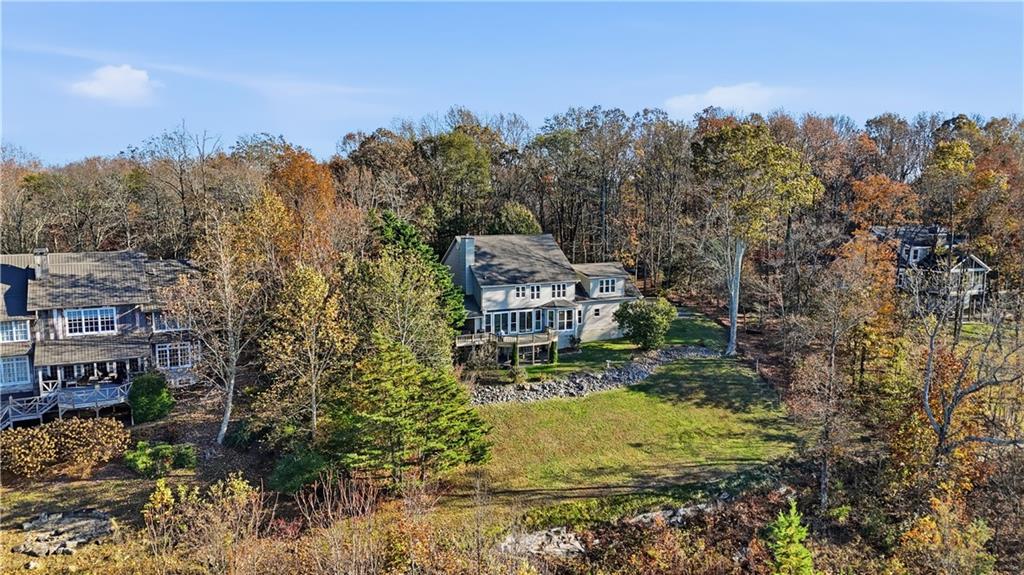 141 Brow Lake Road Lookout Mountain, GA 30750 - Photo 57 of 66 a aerial view of a house with a yard basket ball court and outdoor seating