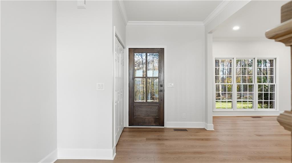 141 Brow Lake Road Lookout Mountain, GA 30750 - Photo 10 of 66 an empty room with wooden floor and a window